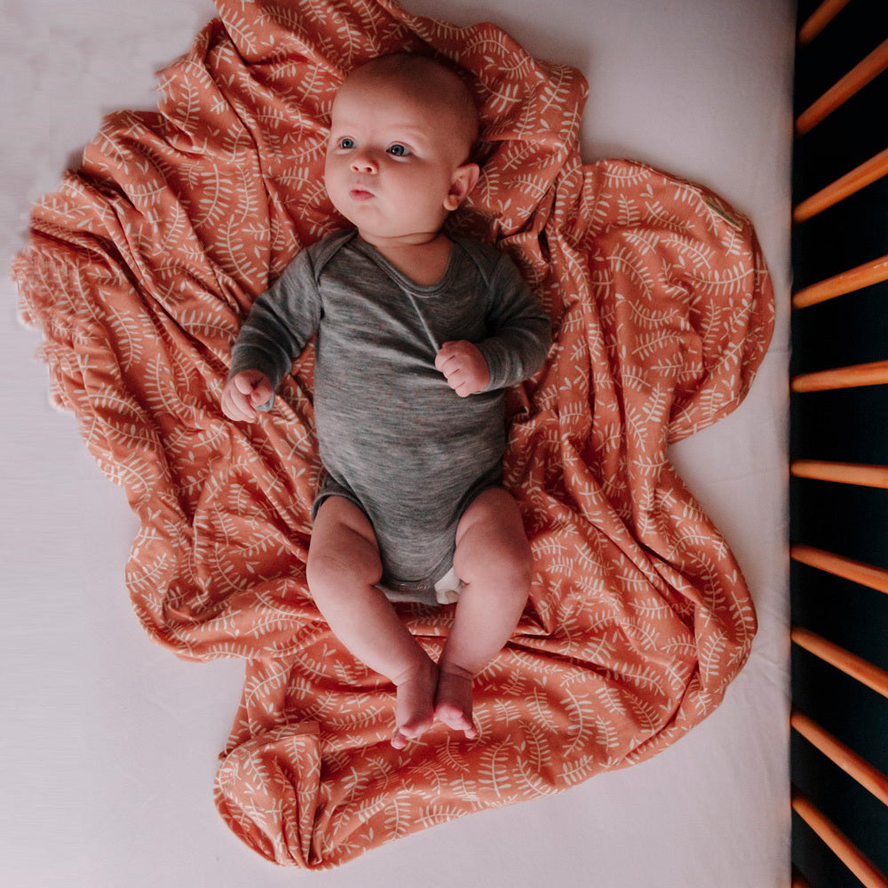 Woolbabe Merino Wool Baby Swaddle - Ember Leaves