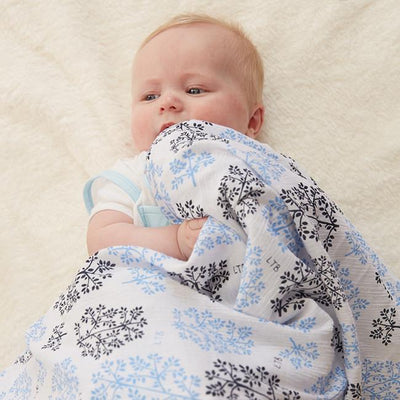 Little Turtle Baby - Stretch Muslin Swaddle - Blue Leaves
