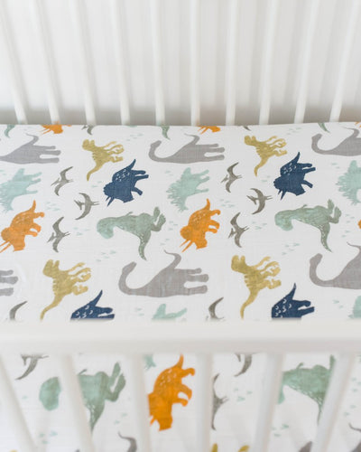 Little Unicorn - Cotton Muslin Cot Sheet - Dino Friends