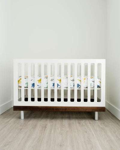 Little Unicorn - Cotton Muslin Cot Sheet - Dino Friends