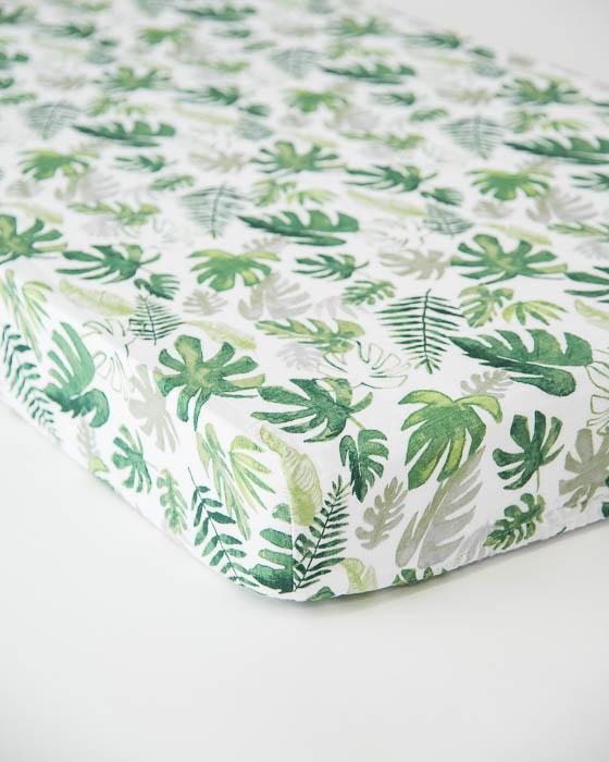 Little Unicorn - Cotton Muslin Cot Sheet - Tropical Leaf