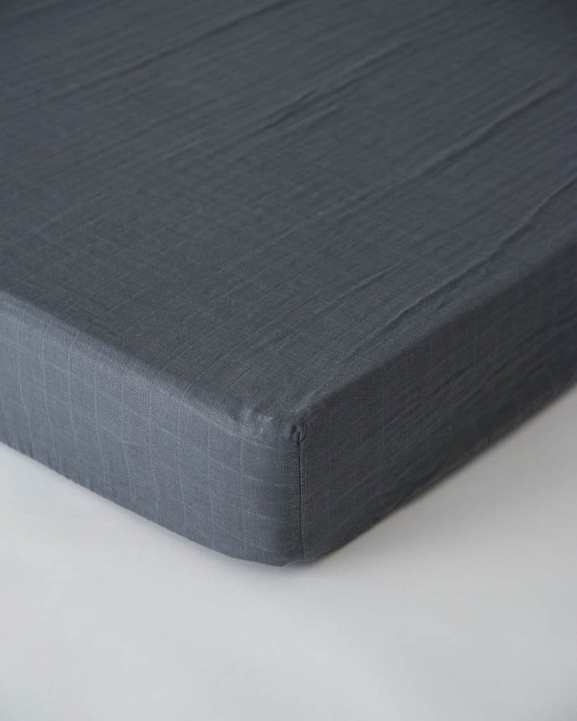 Little Unicorn - Cotton Muslin Cot Sheet - Charcoal
