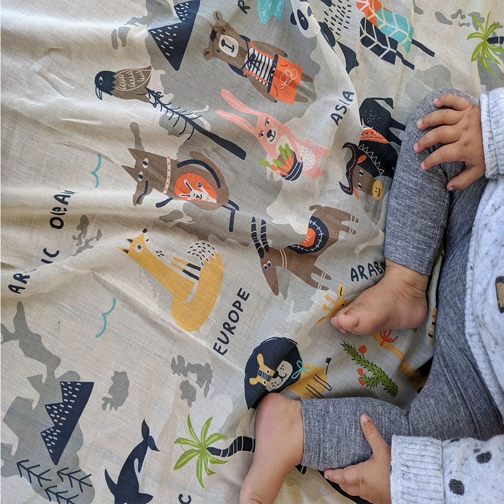 Di Lusso Living - Muslin Baby Swaddle Wrap - Animal Kingdom World Map